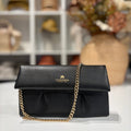 Pochette con catena a spalla