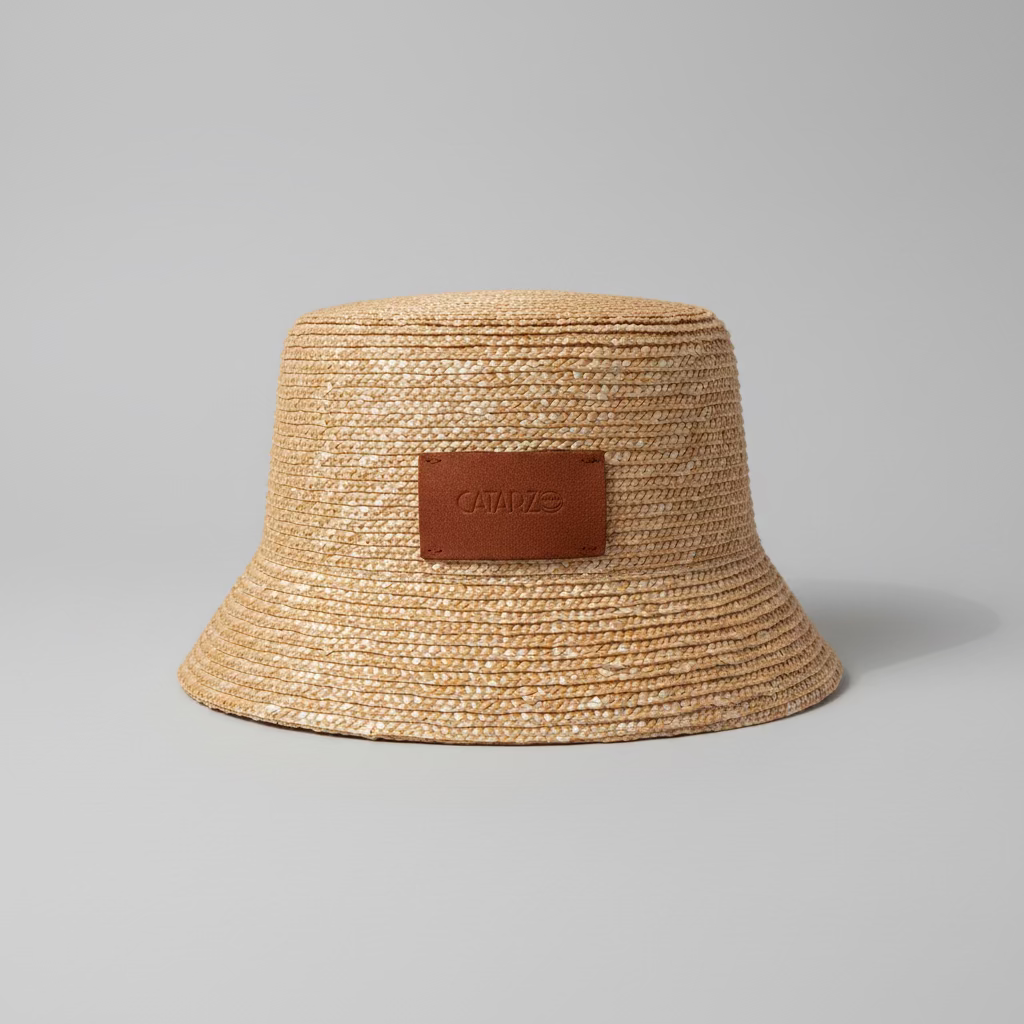 Bucket in paglia con dettaglio cuoio