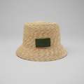 Bucket in paglia con dettaglio verde