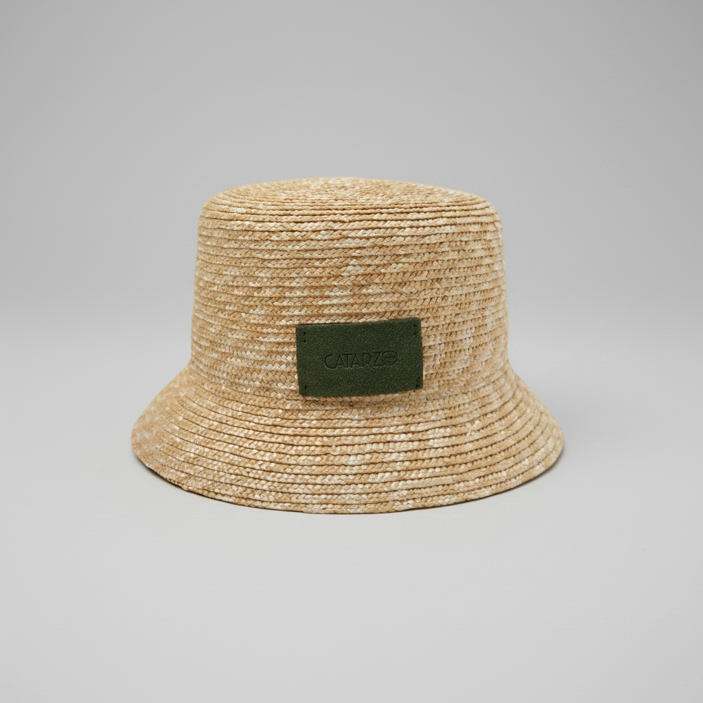 Bucket in paglia con dettaglio verde